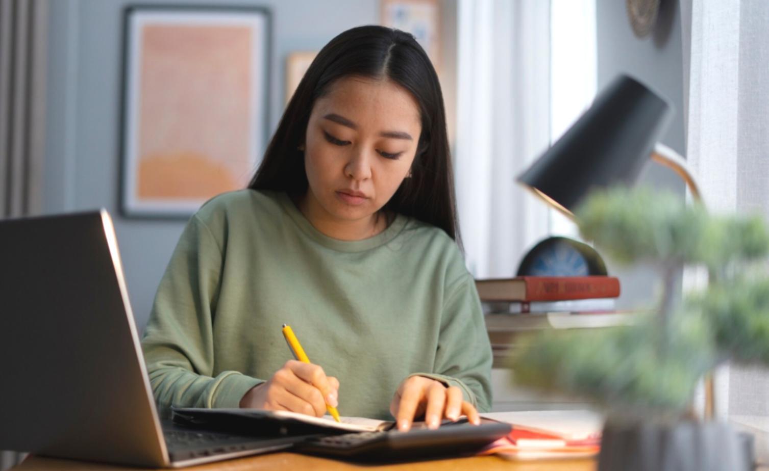 Creative writing workshop environment with notebooks and pens